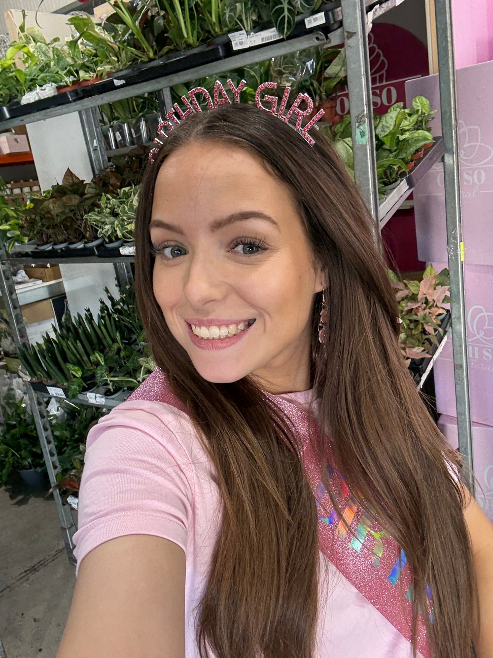 Megan celebrating her birthday at OH SO Floral, wearing her birthday crown and pink sash